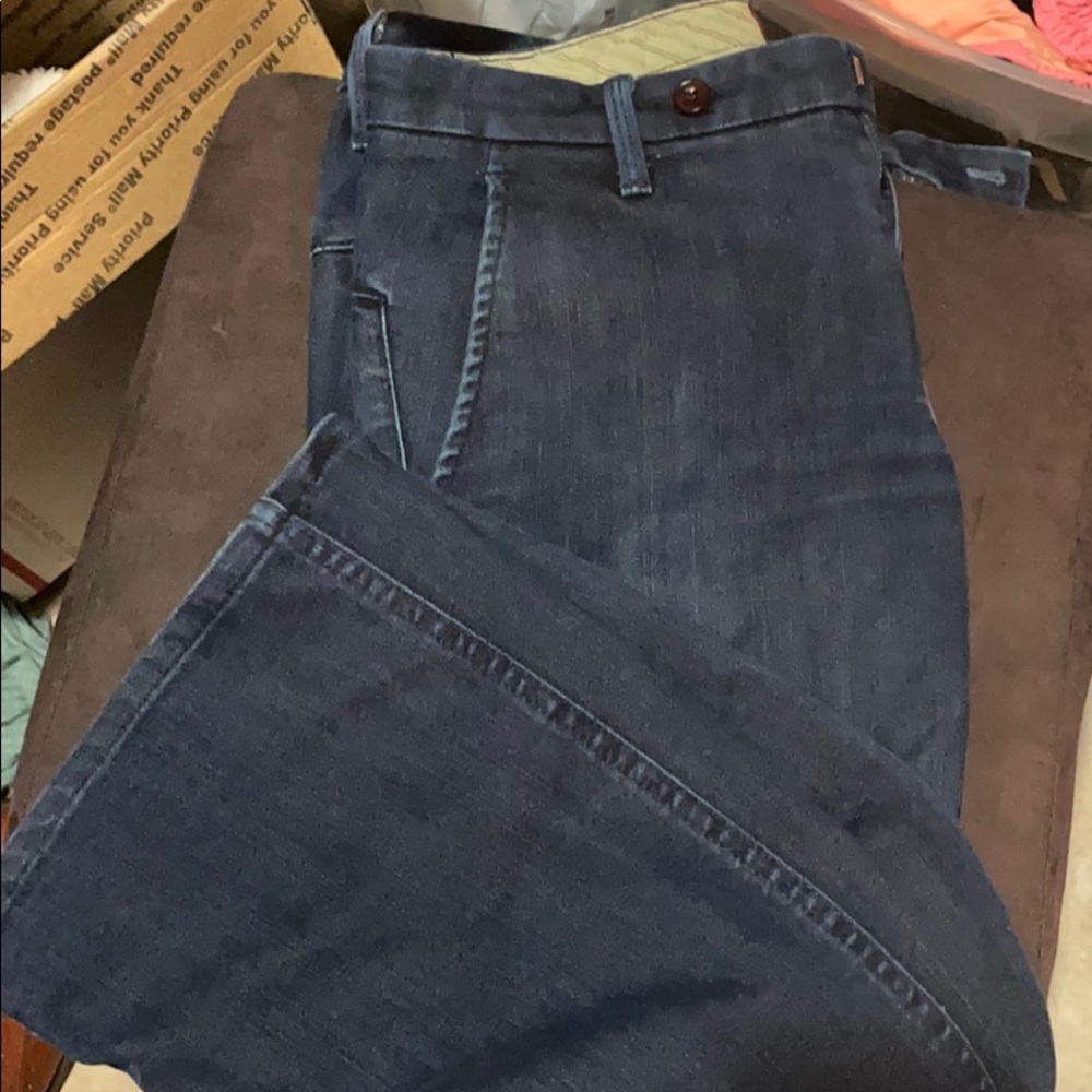 Flare cut raven denim jeans.